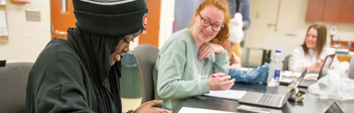 Student with clay in art class