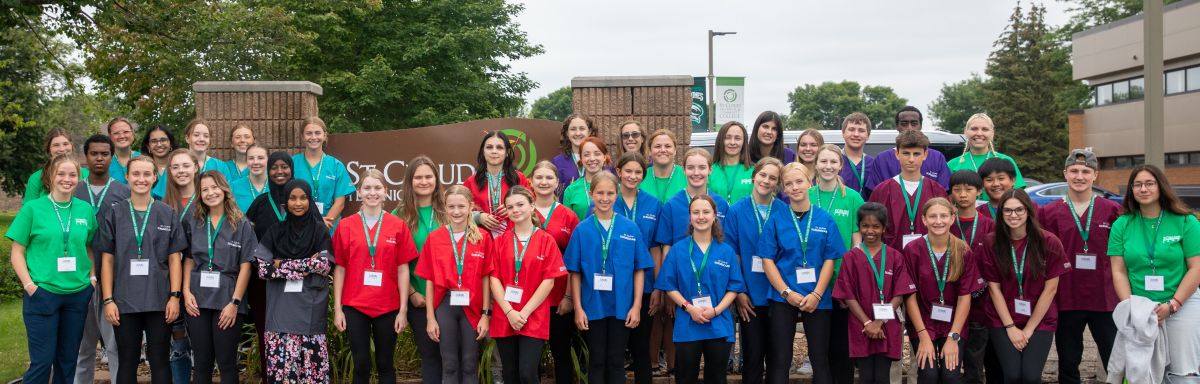 SCRUBS camp campers and staff outside group picture