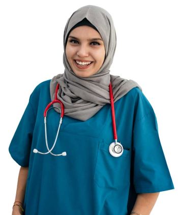 Woman in hijab and scrubs with stethescope smiling at camera