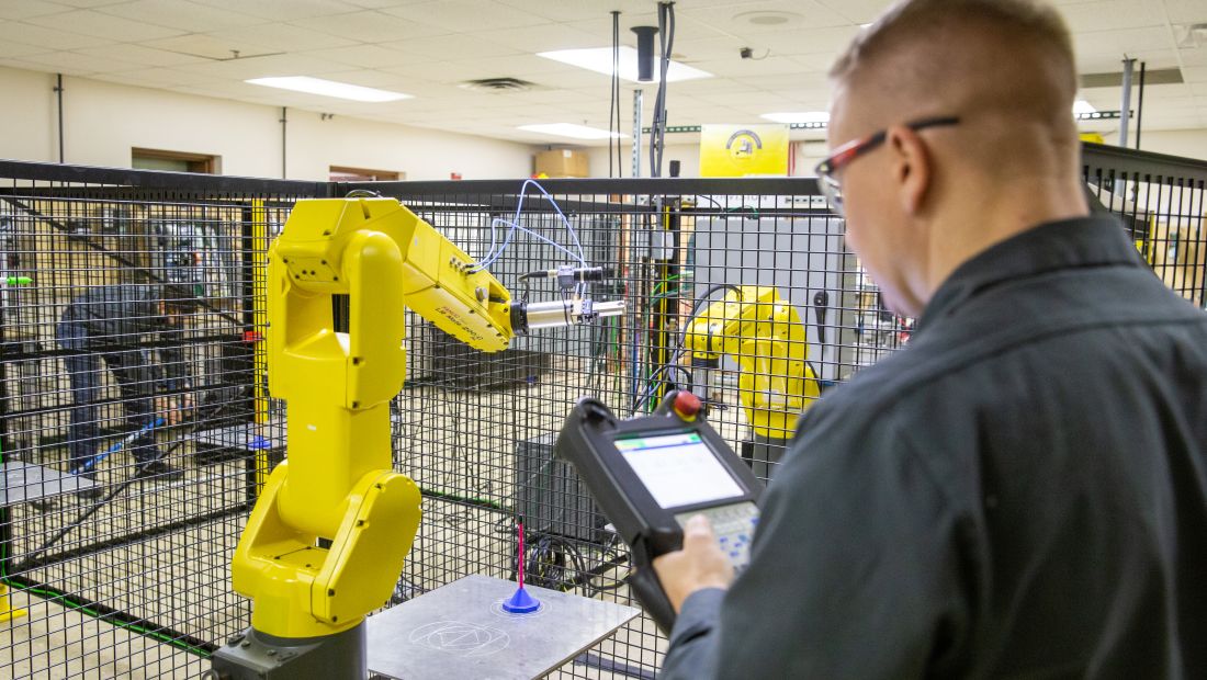 Energy and Electronics student in lab