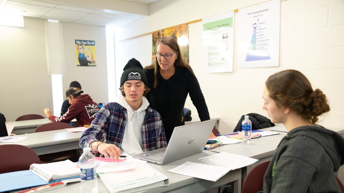 Marketing and Sales Management students with instructor