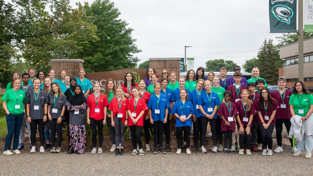 SCRUBS camp campers and staff outside group picture