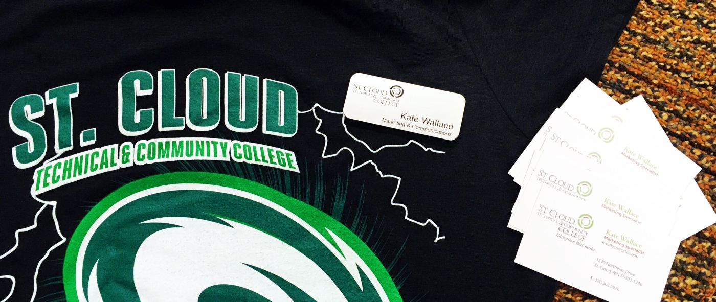 Black shirt with the SCTCC logo, along with an SCTCC faculty name tag and business cards