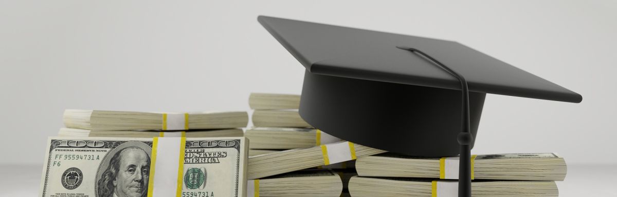 100 dollar bills with grad cap