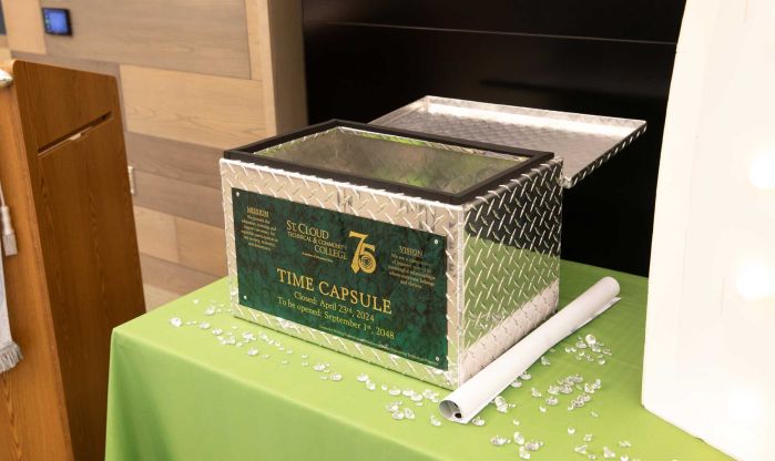 Time capsule metal box on table