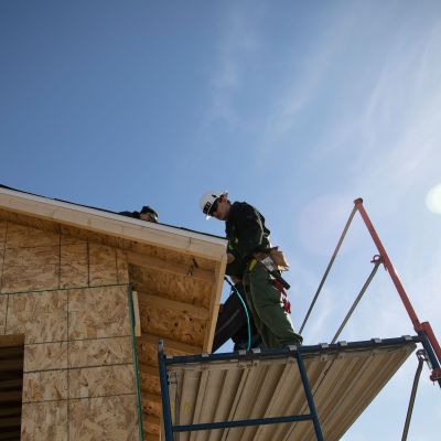 Carpentry students working on roof