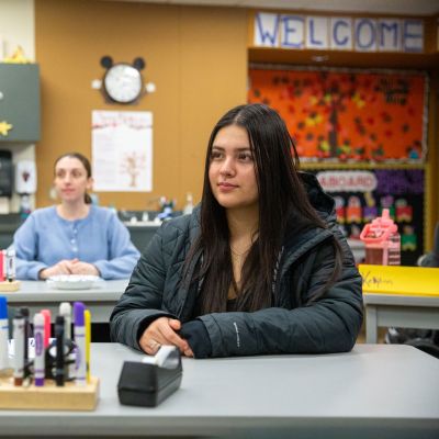 Students in the Education classroom with markers