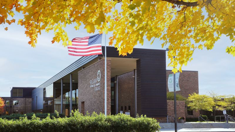 SCTCC main entrance with yellow leaves in forground