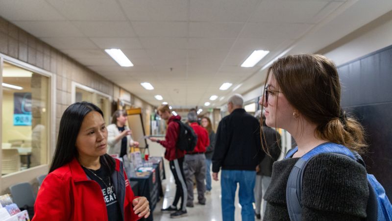 student talking with rep