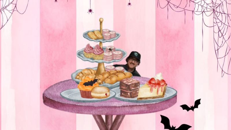 table of desserts with spiderwebs on pink striped background