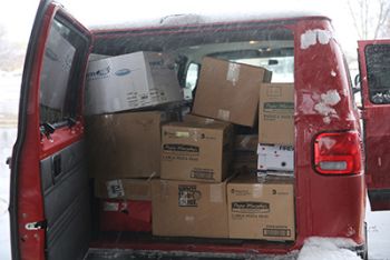 back of van loaded with boxes