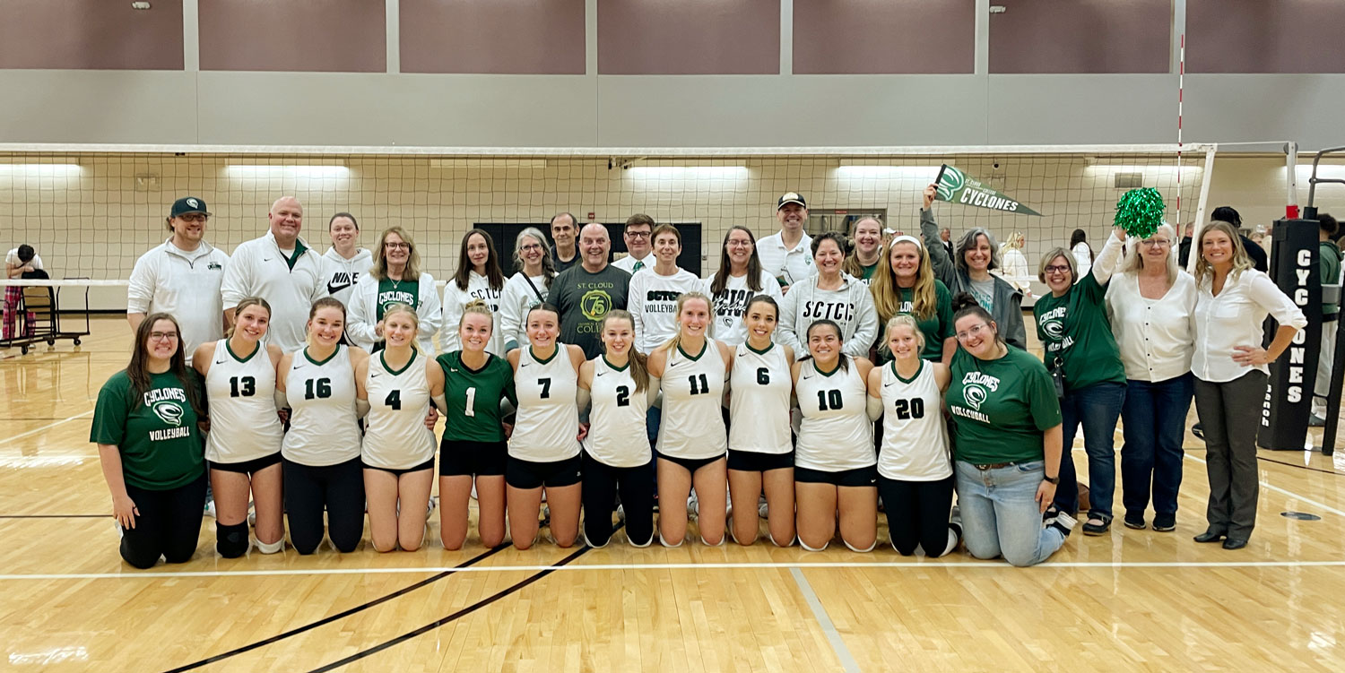 Volleyball team with faculty and staff