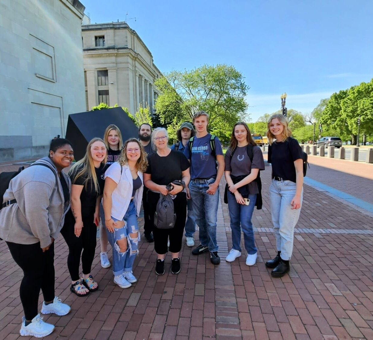 group of students outside museum