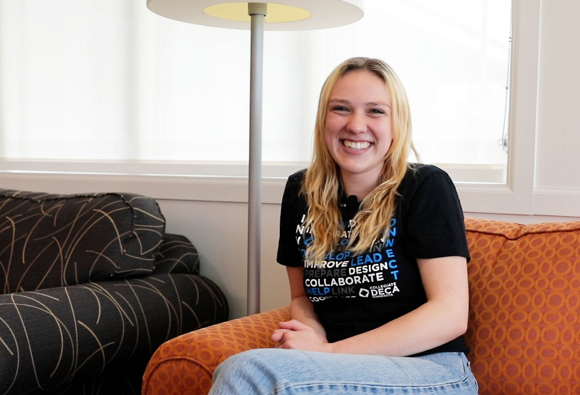 Dannilee Olson sitting on couch